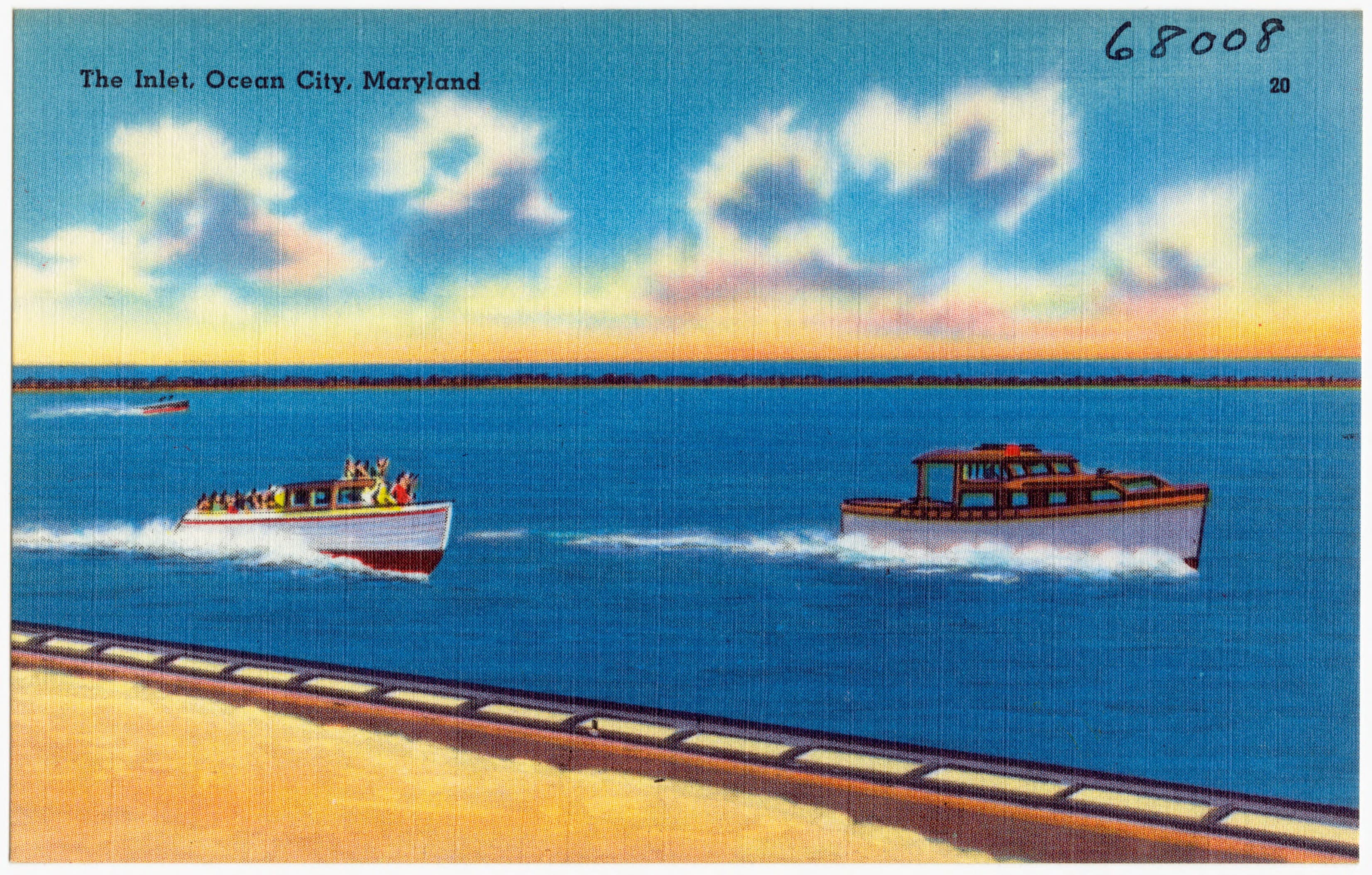 Vintage color postcard looking across the Ocean City Inlet with boats near the shore.